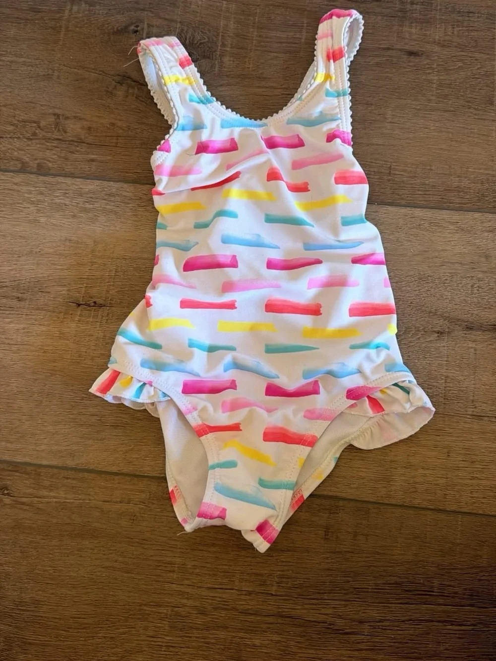Kids White One-Piece Swimsuit with Pink, Blue & Yellow Accents